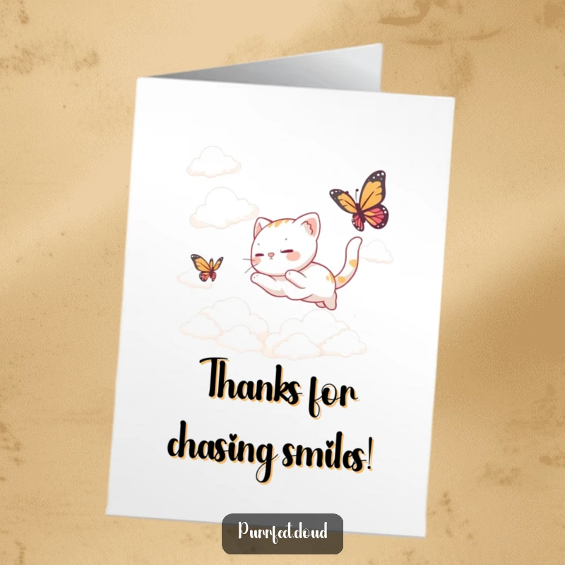 Funny Free Printable Thank You Card of a cat happily chasing a butterfly among clouds.