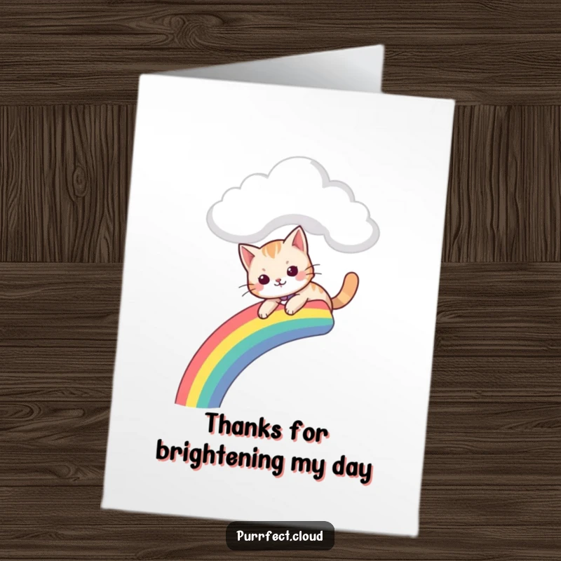 Funny Free Printable Thank You Card: A cat joyfully slides down a rainbow from a cloud, a colourful thank you.