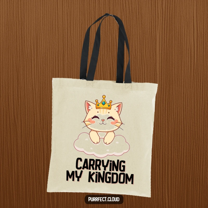 Funny tote bag depicting a cat with a tiny crown reigning imperiously from a fluffy, majestic cloud.