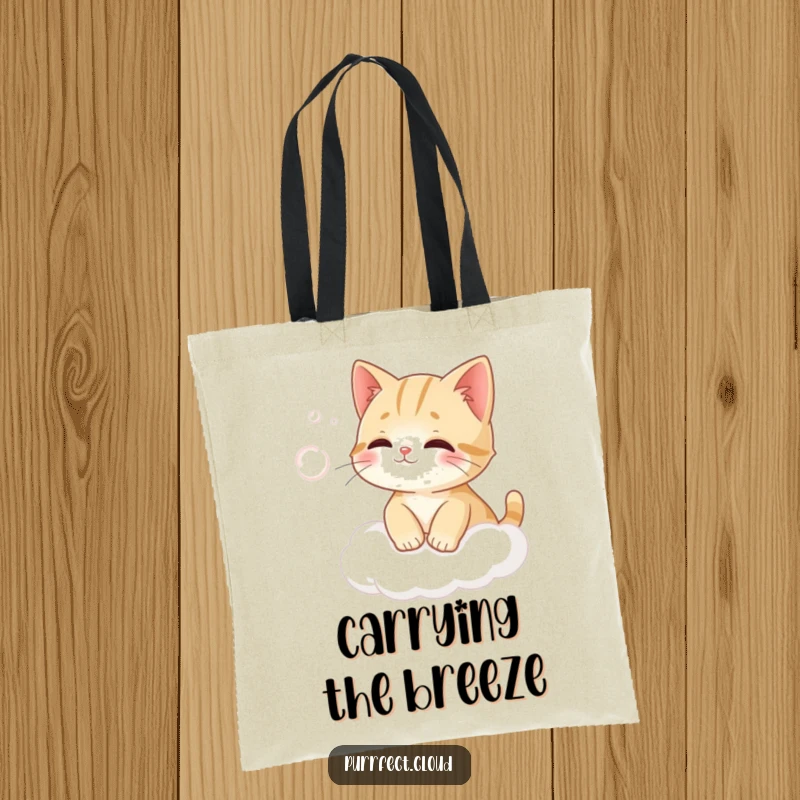Funny cat on a cloud humorously trying to catch wind on a durable and stylish tote bag.