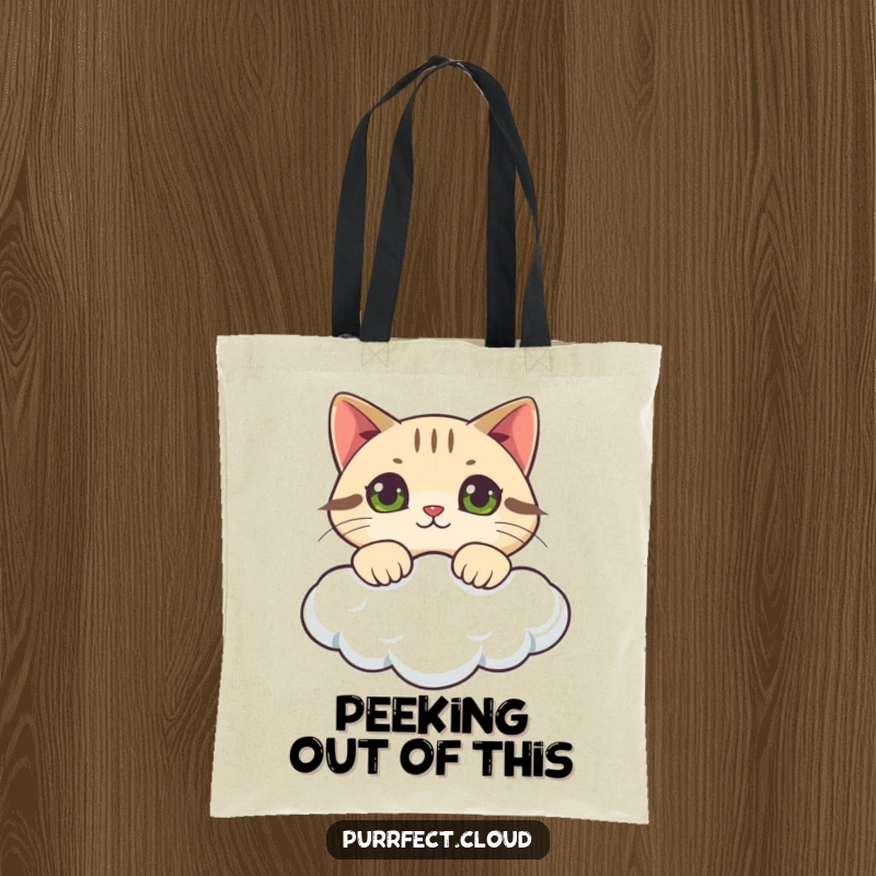 Funny cat tote bag featuring a curious cat peeking over a cloud, practical and humorous for everyday adventures.